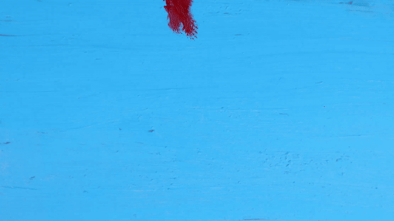 Oil paint on glass animation of blood dropping into water and taking over the whole screen in red