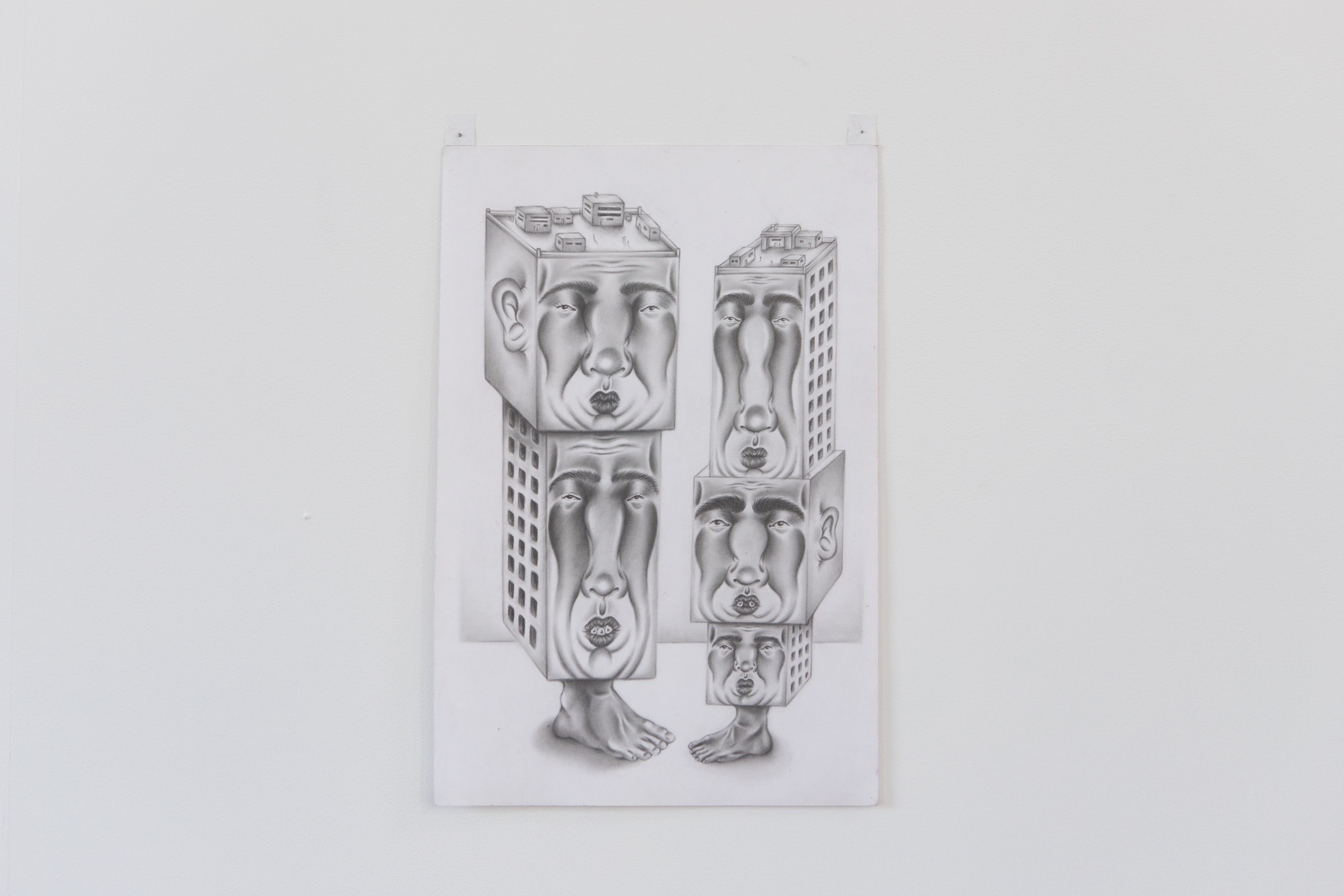 Two looming sentient apartment complex’s 