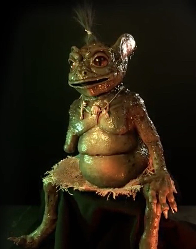 Right side view showing his full arm with claws.