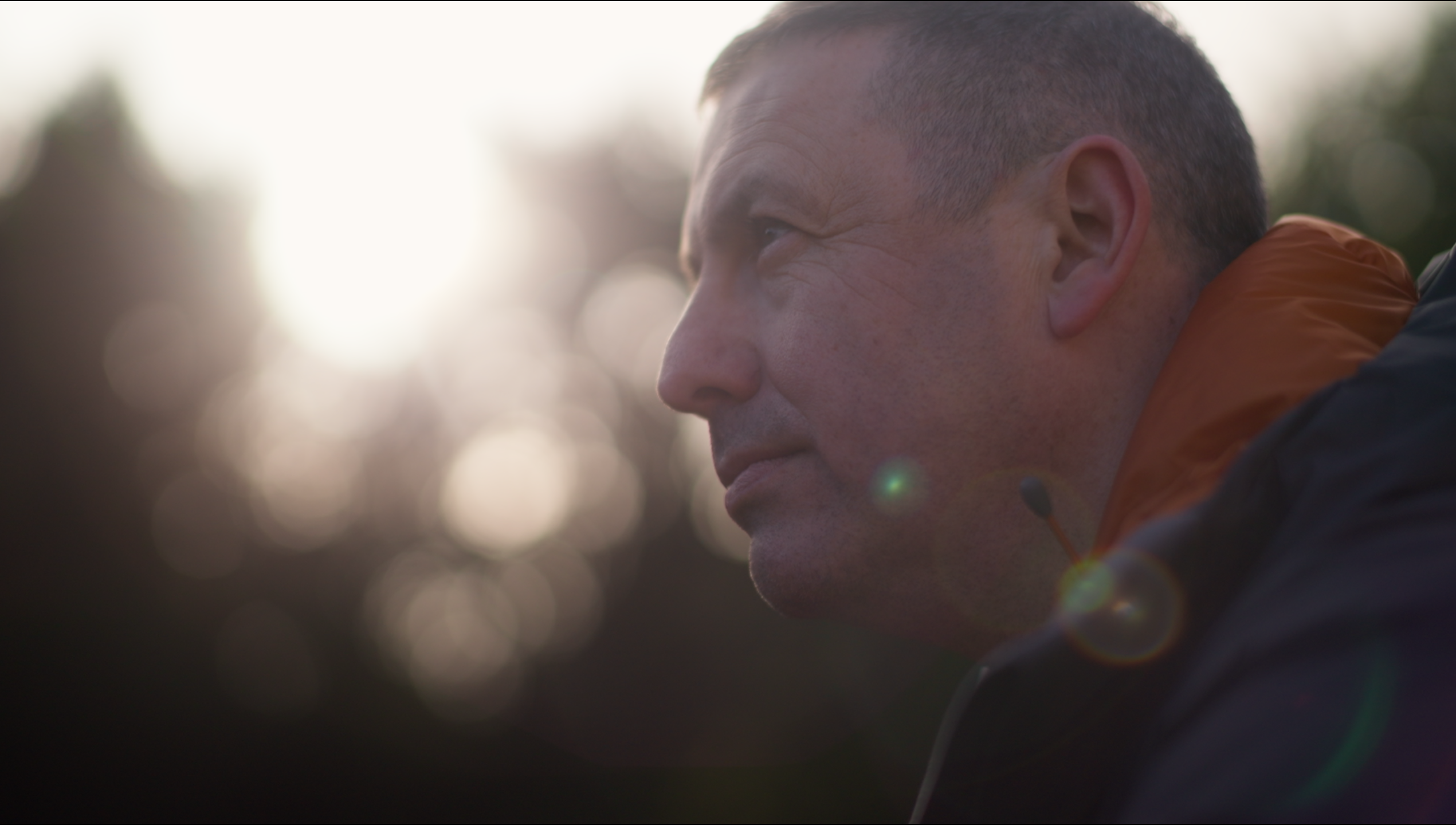 Close up of man with lens flare