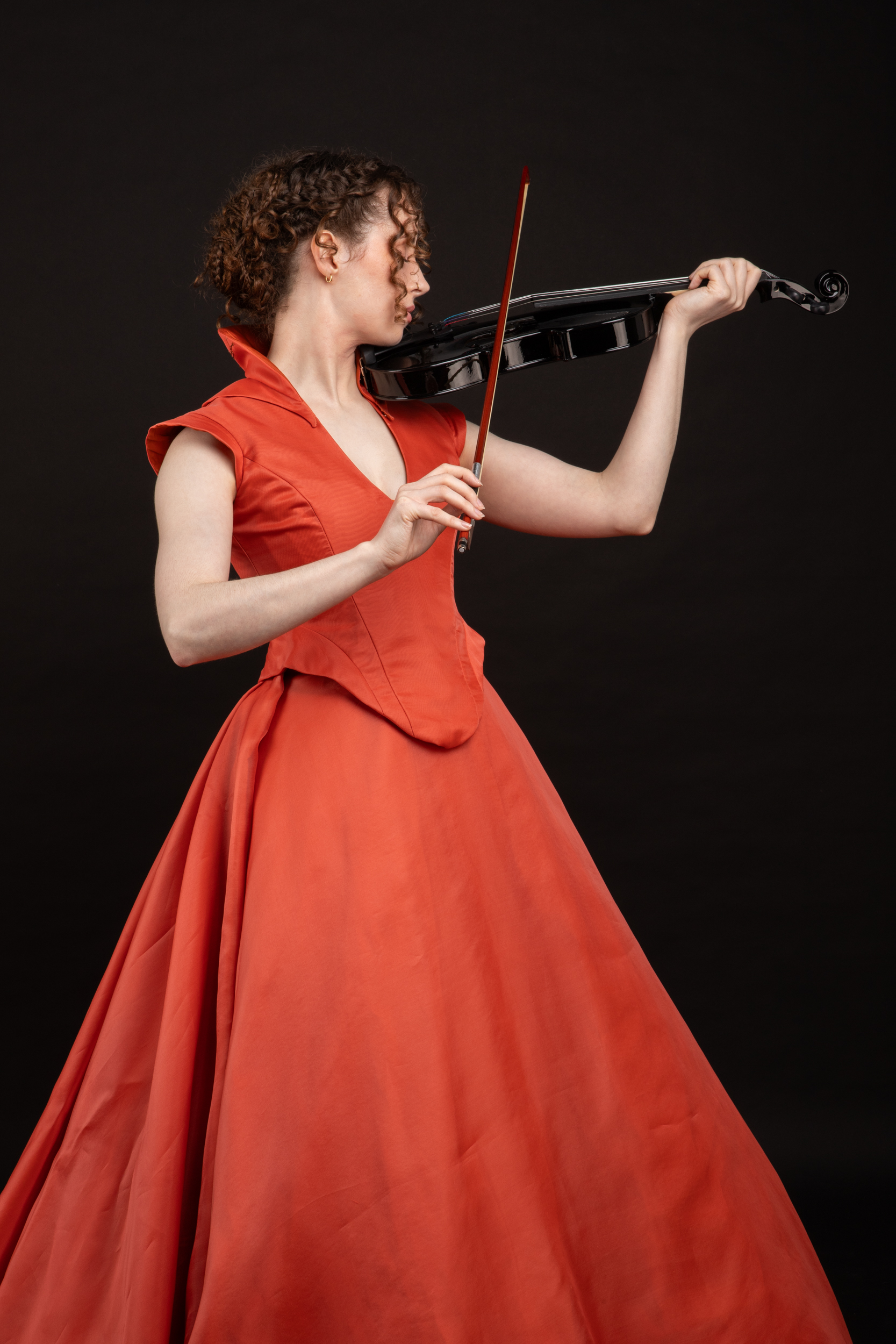 Lady Fire playing the violin