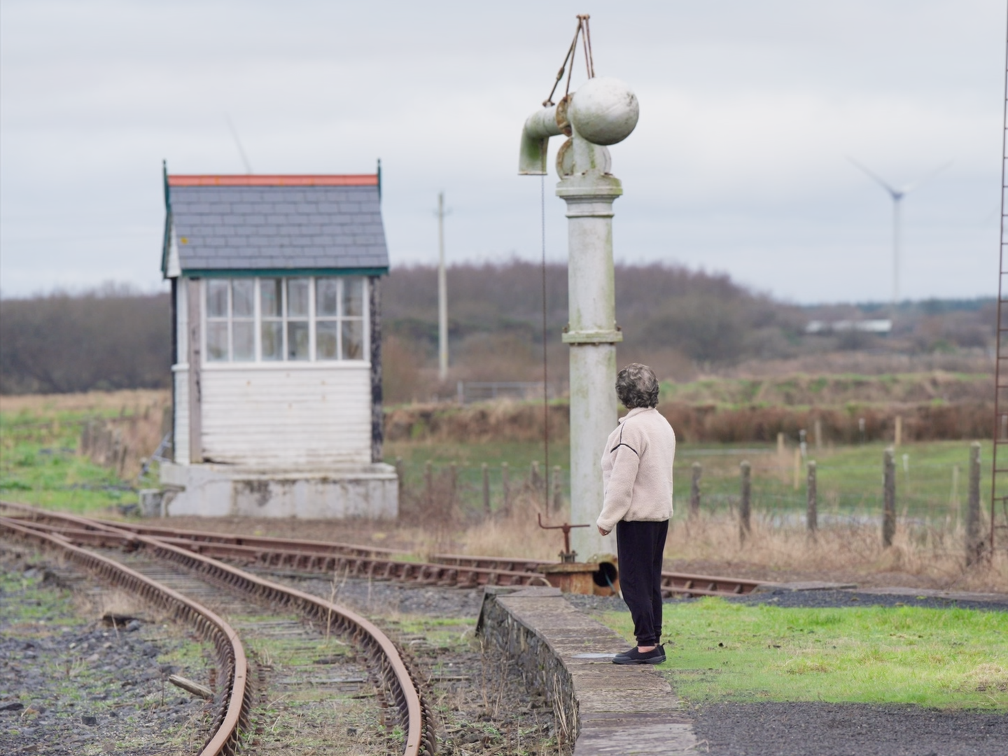 Ann waiting for train