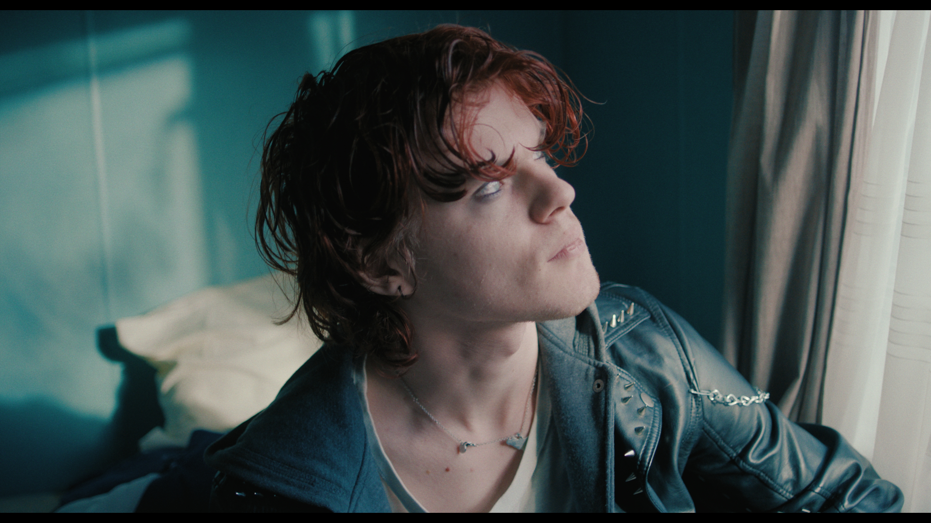 Tymek looking out a window