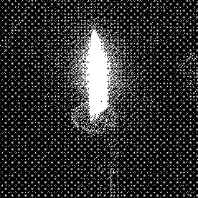 Close up of the fire on a candle, with wax collecting and dripping down the side of the candle