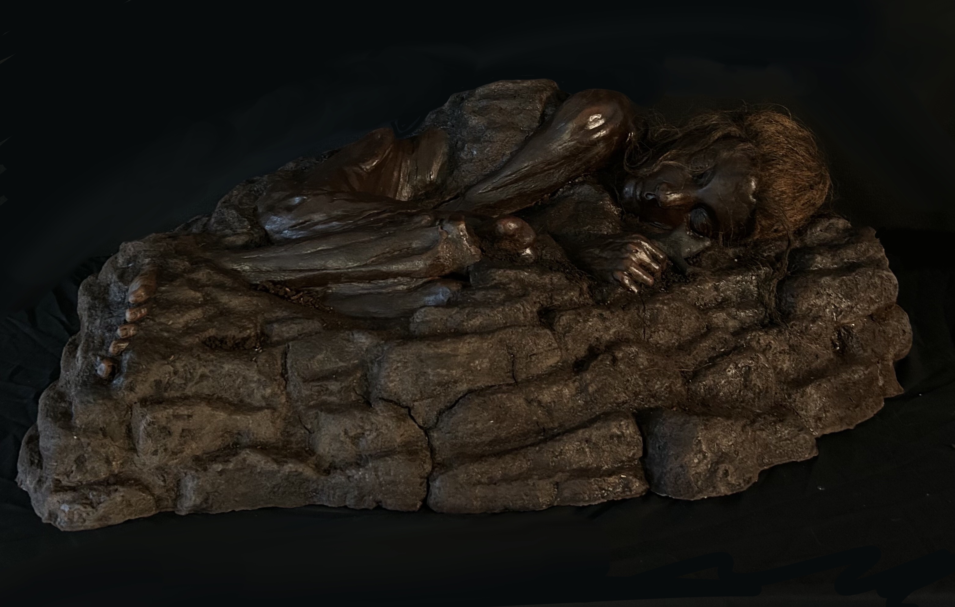 Full body photo of bog body