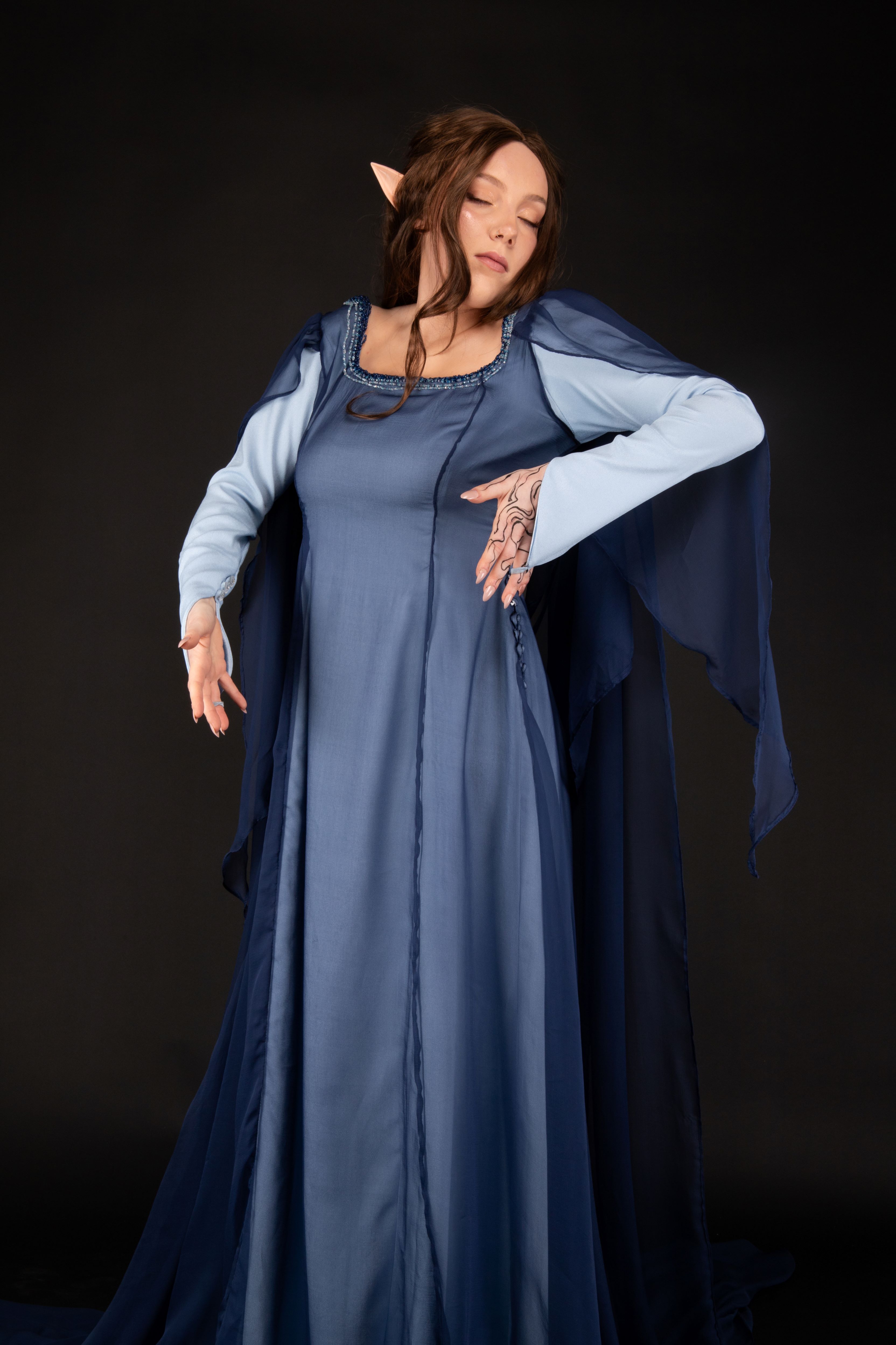 This photograph captures Feyre Archeron in a spell casting movement. Modelled by Ellen Farquhar and photographed by Sarah Lordan. 