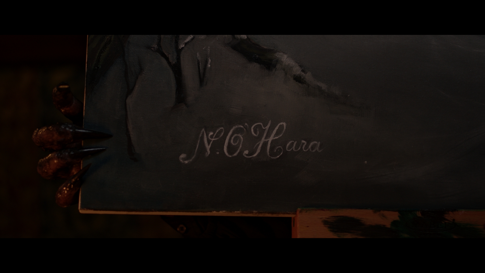 the ghost's hand creeps up on nora's signature 