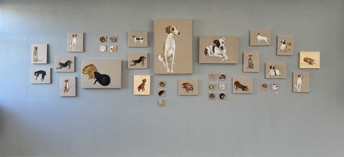  Multiple paintings arranged in salon style on studio wall for On Show  IADT 2025