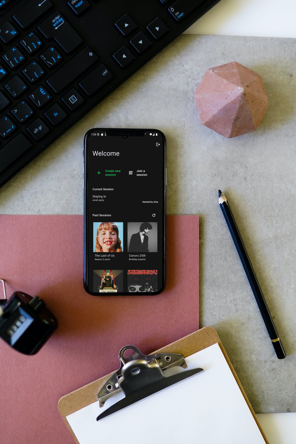 a smartphone on a desk displaying a homepage