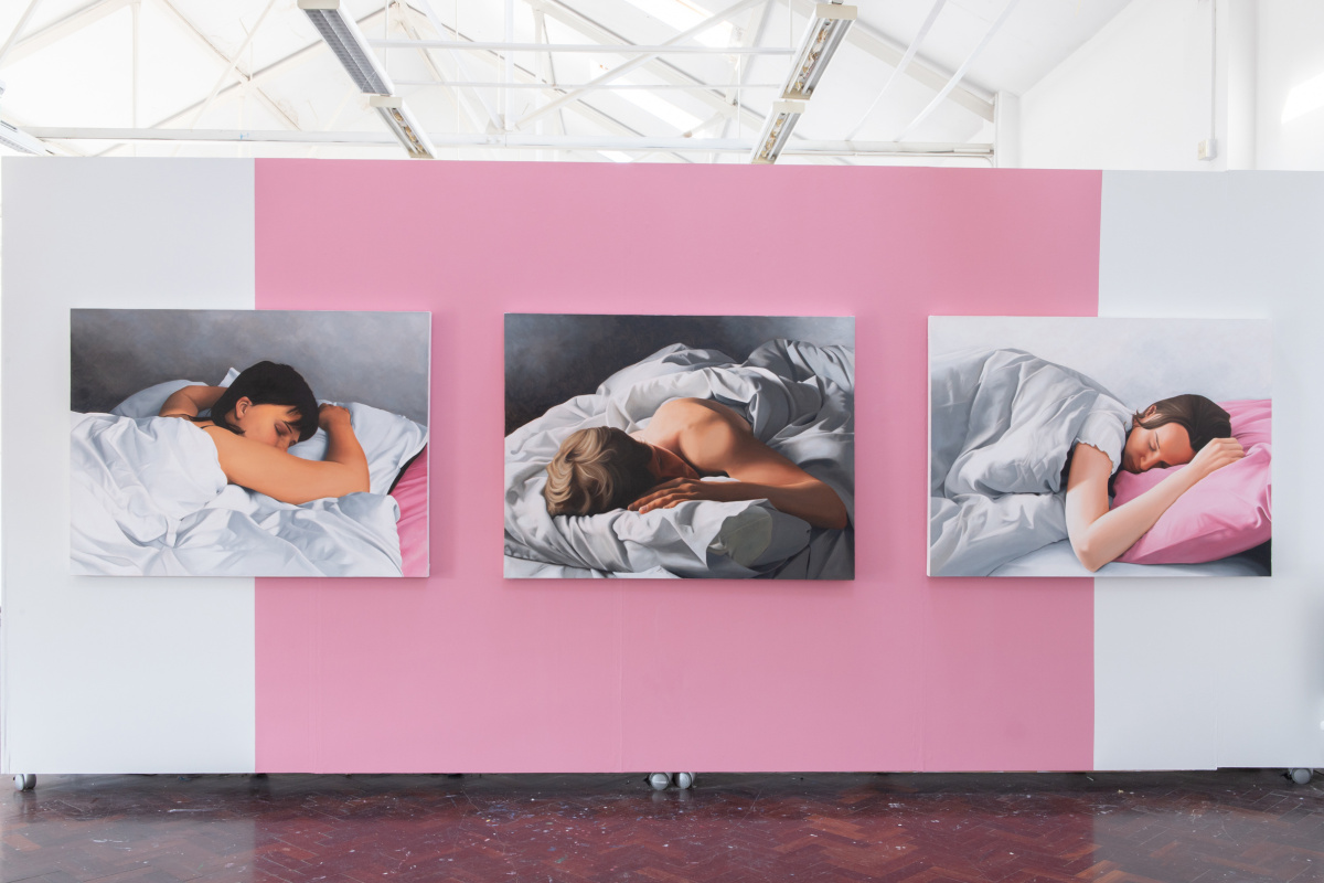 Installation of three large oil paintings, showing people sleeping during the day time