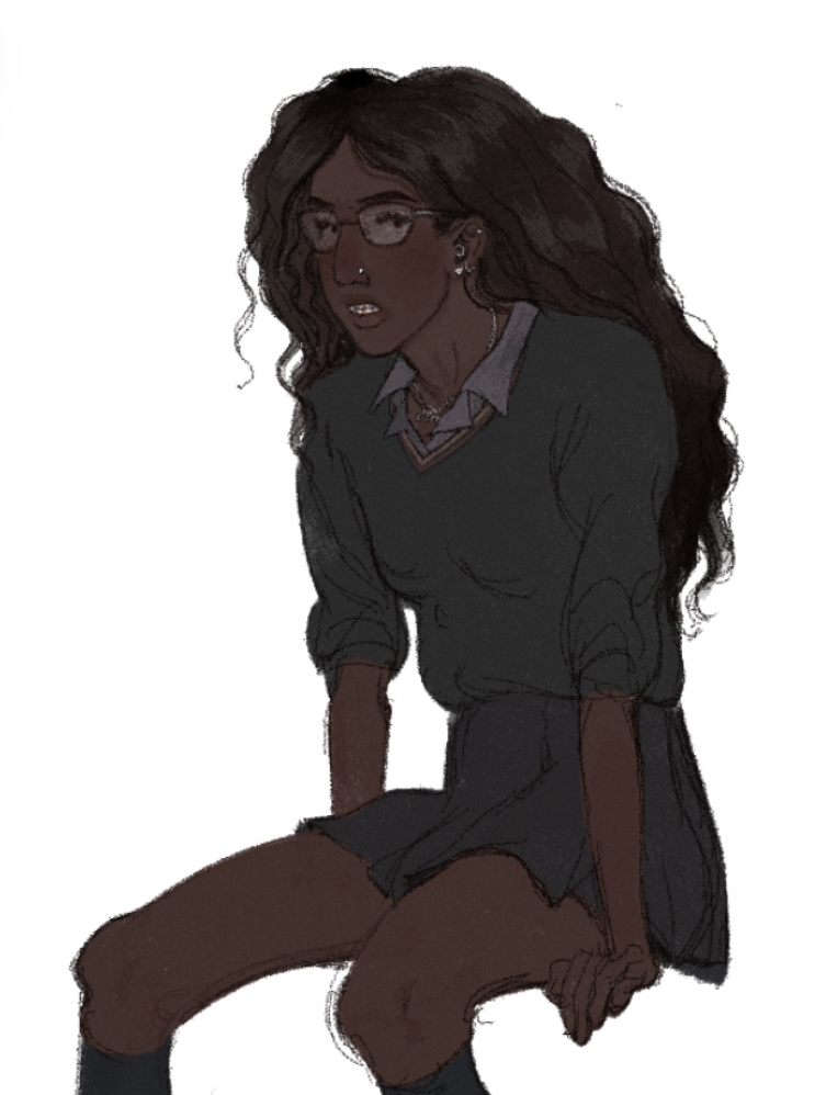 A young girl sitting down in a school uniform.