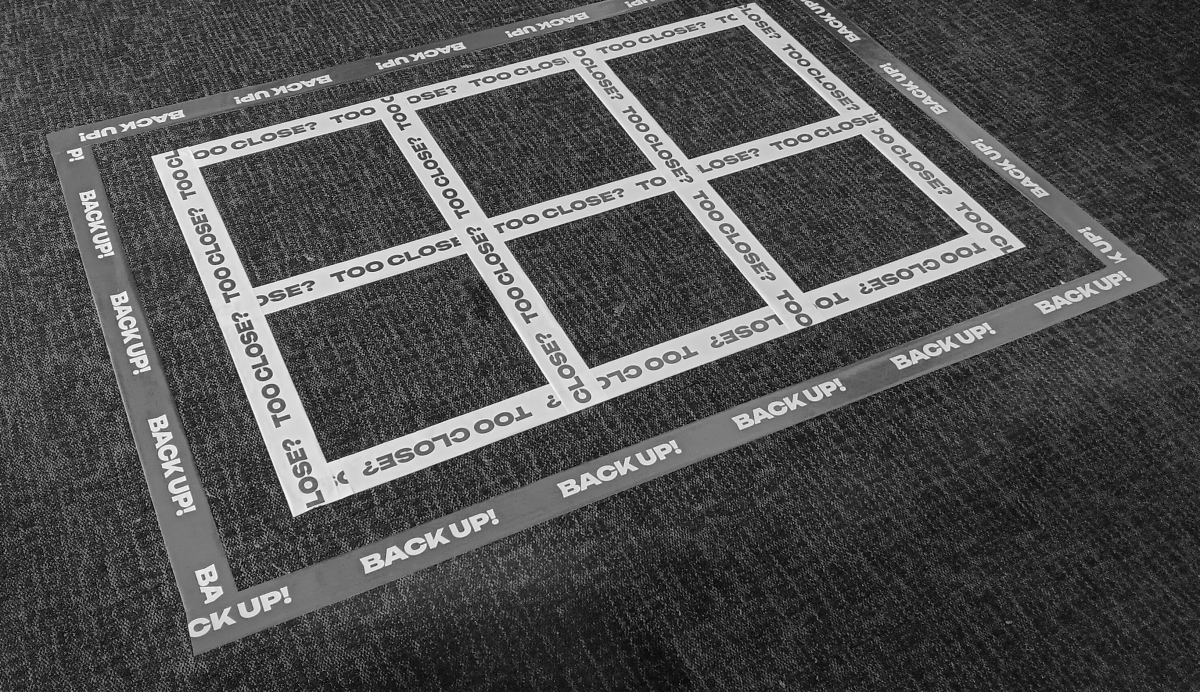 Tape on ground of experience.