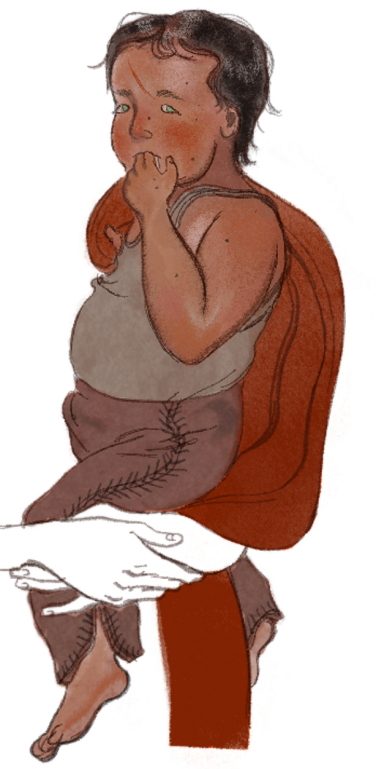 Disembodied hands holding an infant upright. The baby has bright green eyes and a scratch on its forehead.