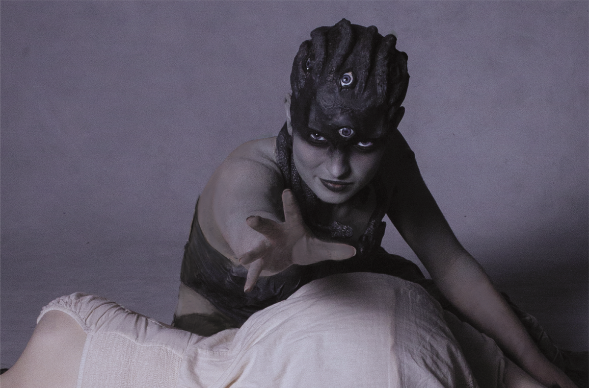 Medusa is stretching her hand towards man tempting to catch him.