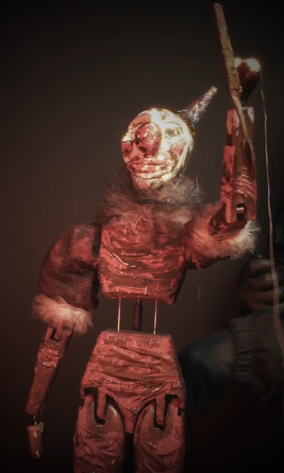 Clown being filmed stabbing with his weapon