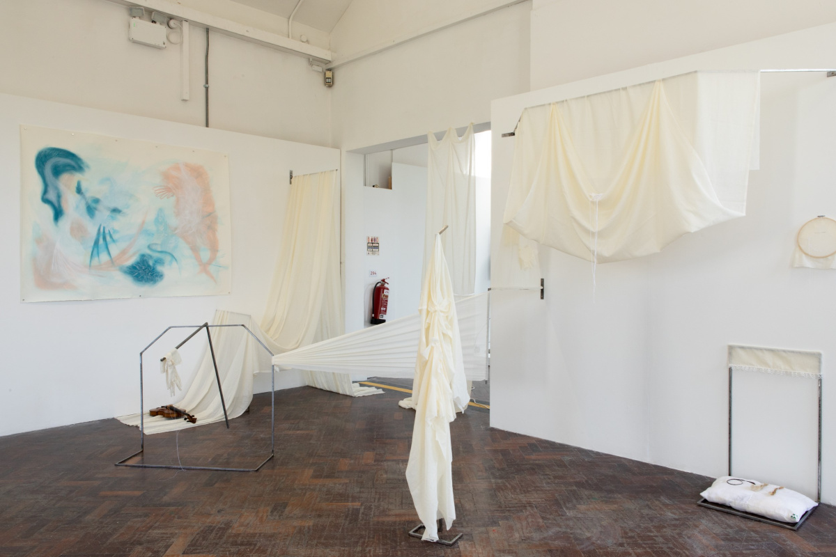 Síofra Ní Bhroin, **Truth to tell, just being here, Housed alone, housed together,**, 2025. Cotton muslin, Violin, Yarn, Thread, Hawthorn dye, Mild steel.