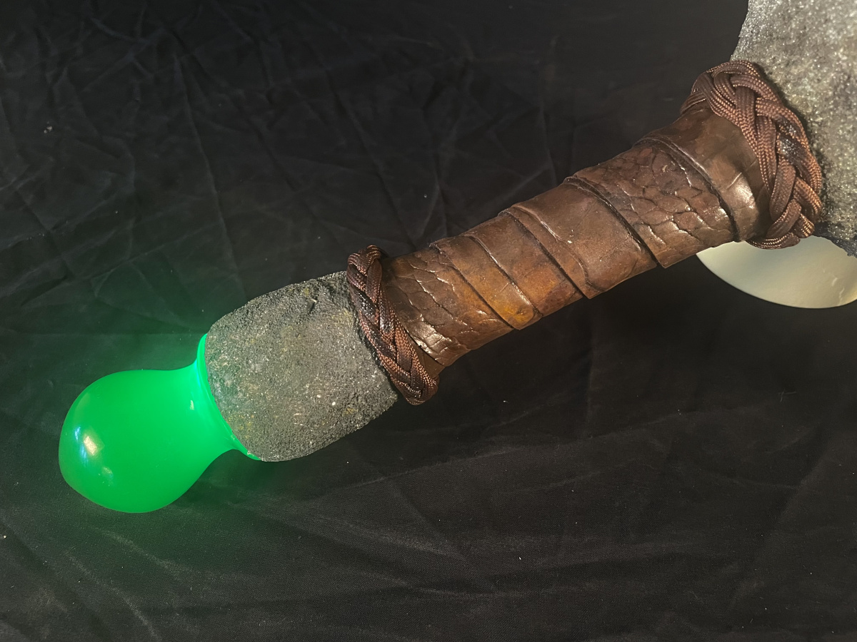 Glowing pommel of axe 