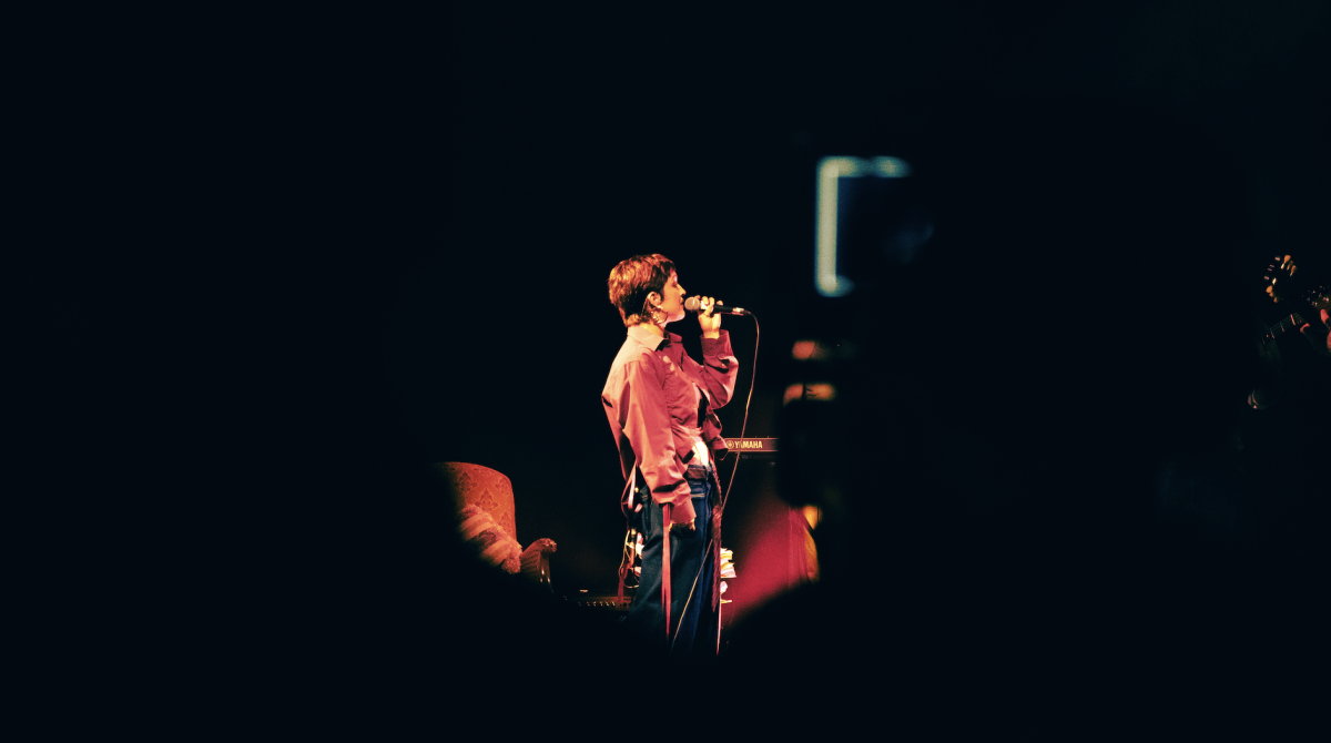 Artist in the distance singing