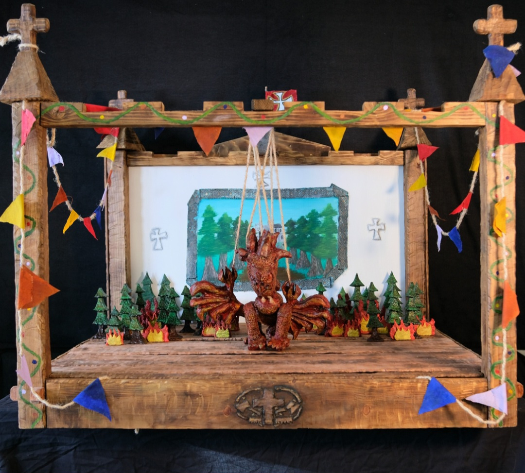 Beauty shot of Dragon puppet and theatre set