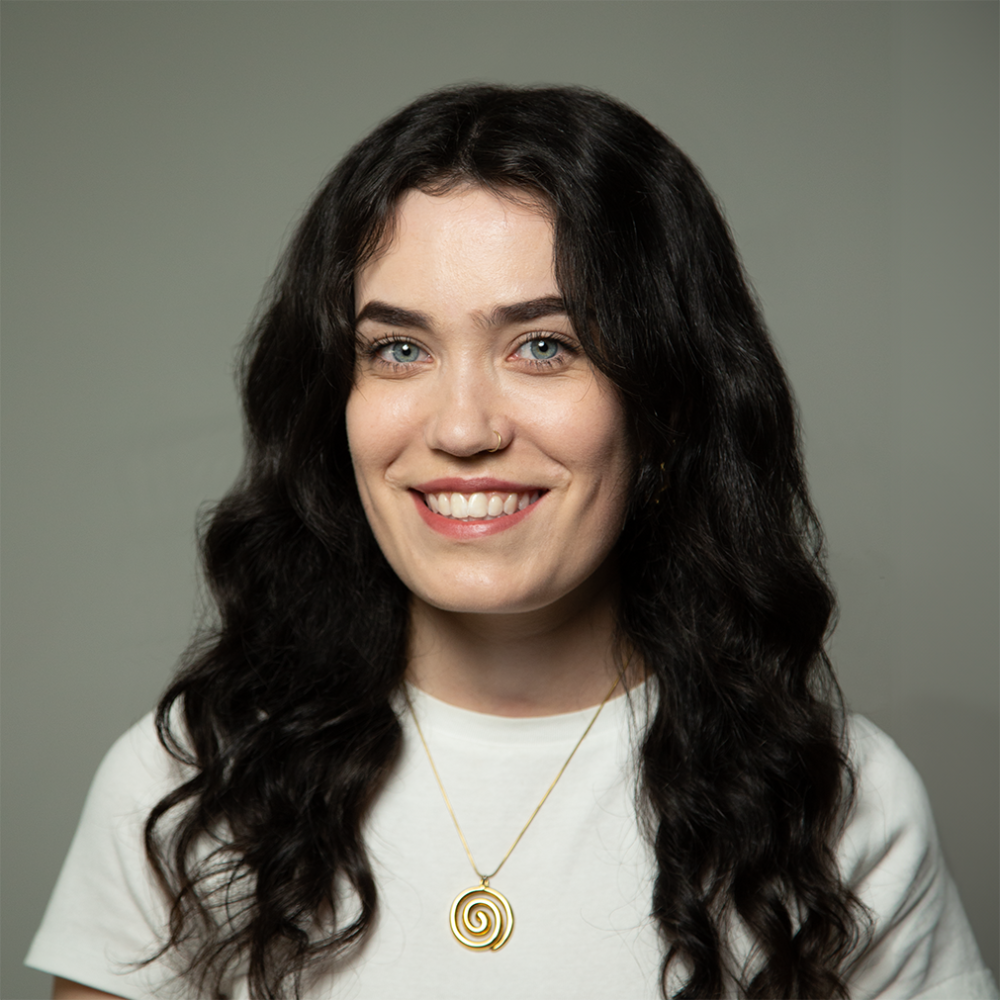 Woman with black hair smiling
