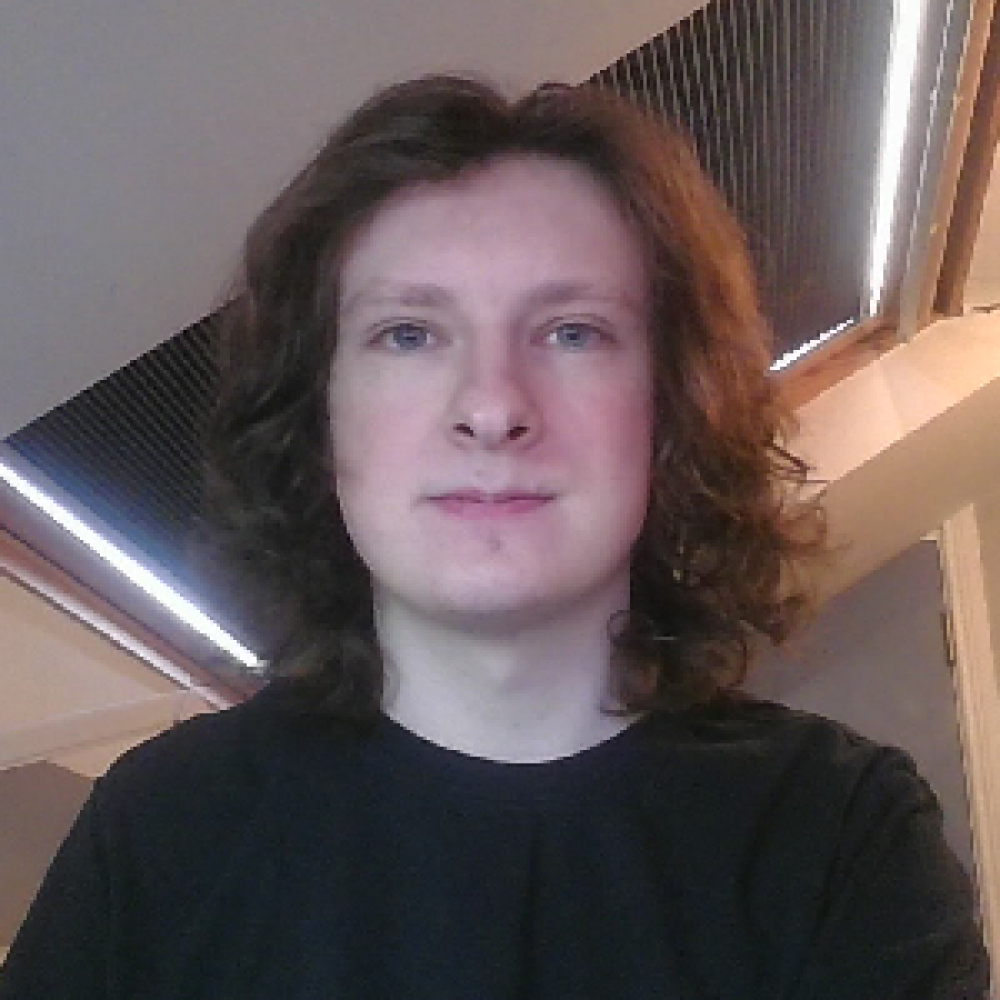 Passport-style photograph of the student.